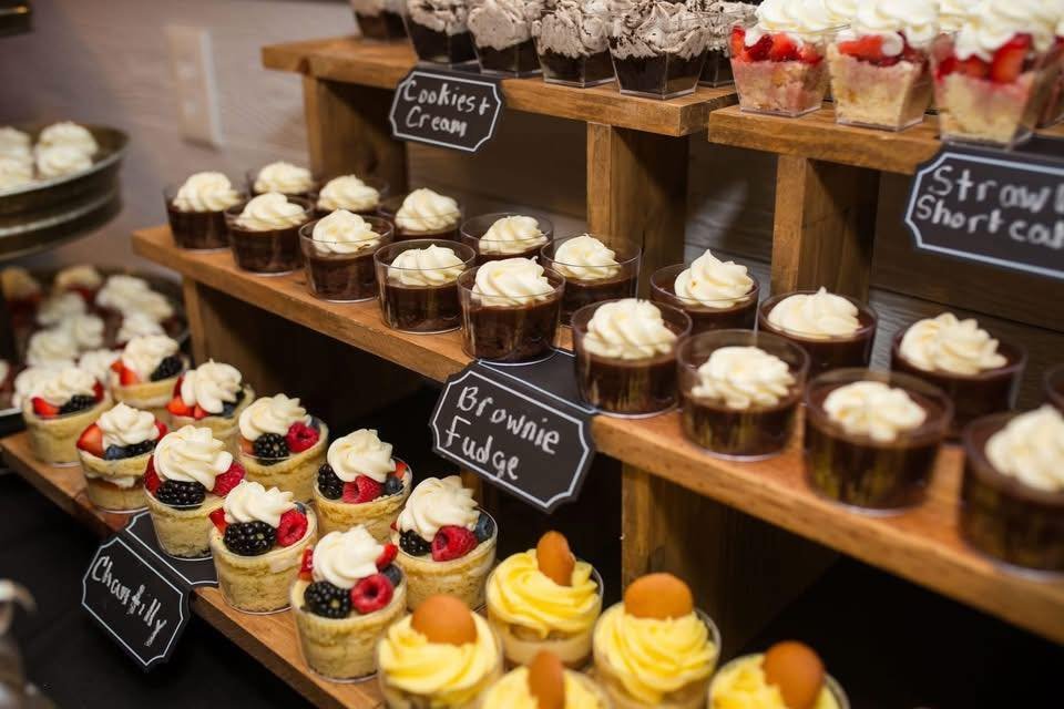 Sweet Cravings dessert bar with mini desserts and flavor signs